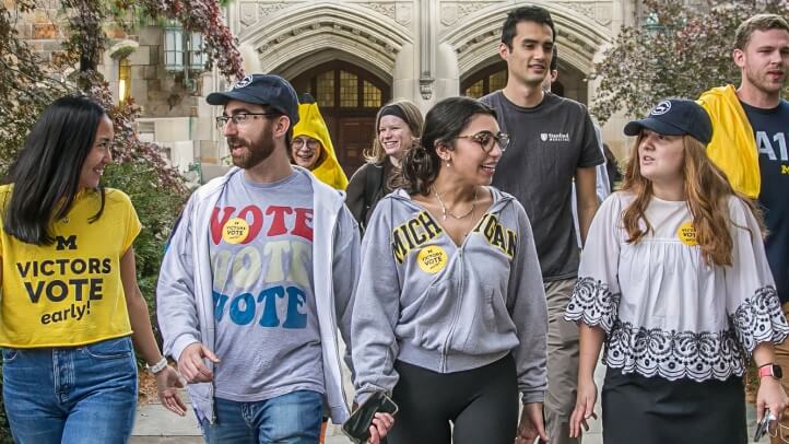 Group of Michigan Law Students walking from the Law school to vote.