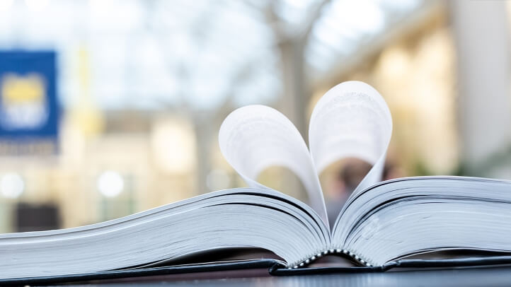 Pages of a book folded to look like a paper heart.