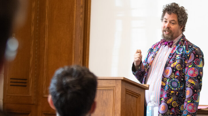 Nicholson Price teaching in a room of Michigan Law students.