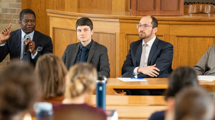 Michigan Law professors Ekow Yankah, Paulina Arnold, Noah Kazis, Evan Caminker speak at the Immigrant Enforcement Panel.