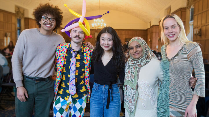 Brad Gonzalez, Noah Rotroff, Jennifer Jiwon Kim, Raisa Faatimah, and Isabel Bysiewicz gather together at the Michigan Law public interest storytelling event, The Valiant.