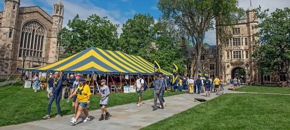 Michigan Law alumni gather for a reunion outside in the Law Quad.
