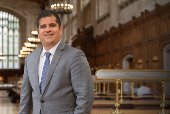 Portrait of Michigan Law Dean Neel Sukhatme in the Reading Room.