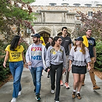 Group of Michigan Law Students walking from the Law school to vote.