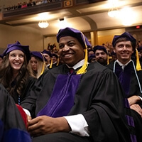 An audience of graduating Michigan Law students seated at the graduation commencement ceremony.