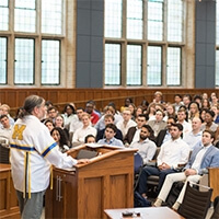 Matthew Fletcher engages a room full of Michigan Law students.