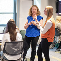 Jessica Lefort and Amy Sankaran with students in the Michigan Law Immigrant Justice Lab.