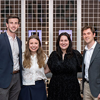 Henry Evans, ’26, Gina Gasparotto, ’26, Taylor Hopkins, ’24, and Graham Hardig, ’26, at this year’s annual Fiske Fellowship dinner.
